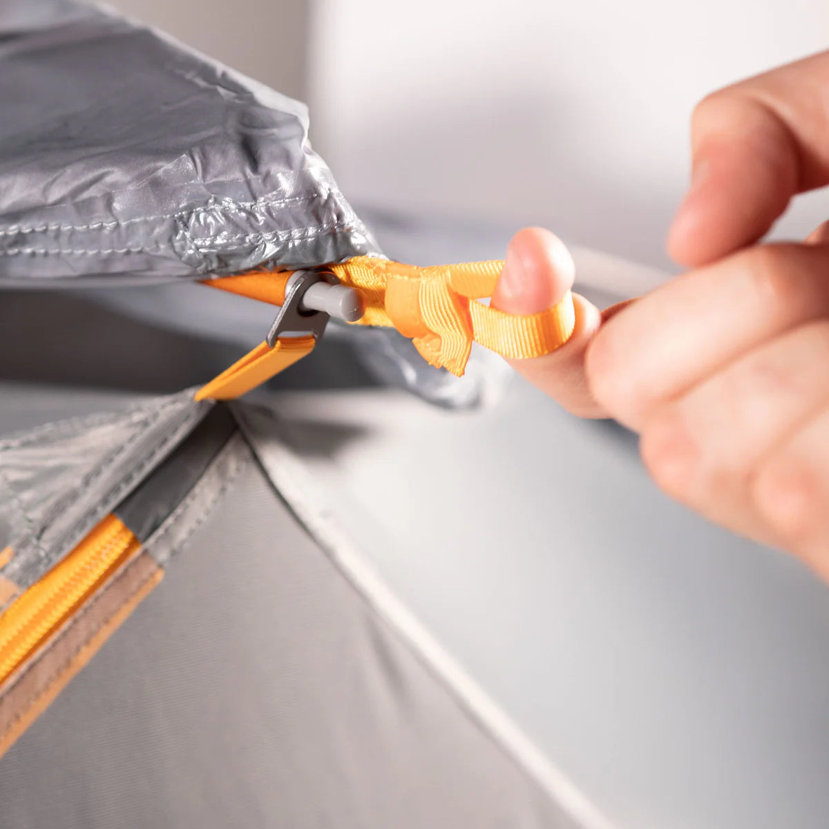 Maxfield tent with three-port ventilation and nylon mesh panels designed to reduce condensation and increase airflow during camping