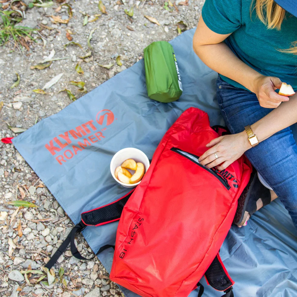Detailed view of a reinforced tether point on the Roamer Throw Tarp, designed for secure and customizable setup configurations.