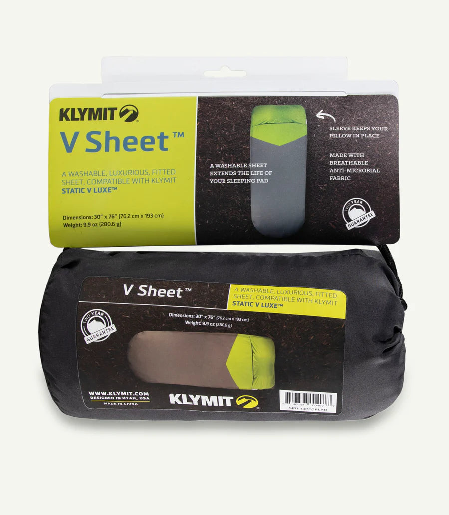 The Quilted V Sheet folded compactly into its packable size (8 x 3 in), demonstrating its portability and convenience for travel.