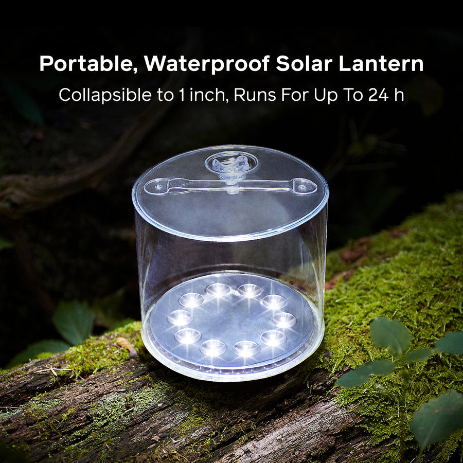 Portable, waterproof solar lantern on a mossy log with text about its features.