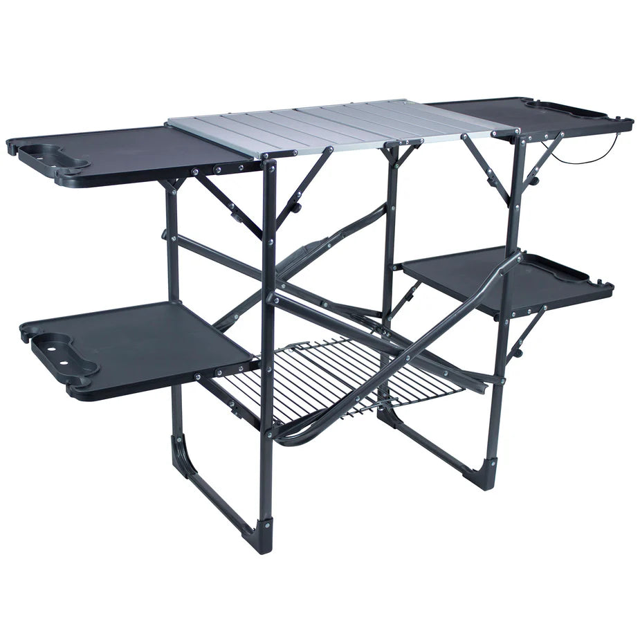 Outdoor cook station with aluminum countertop, fold-out side tables, and storage rack.