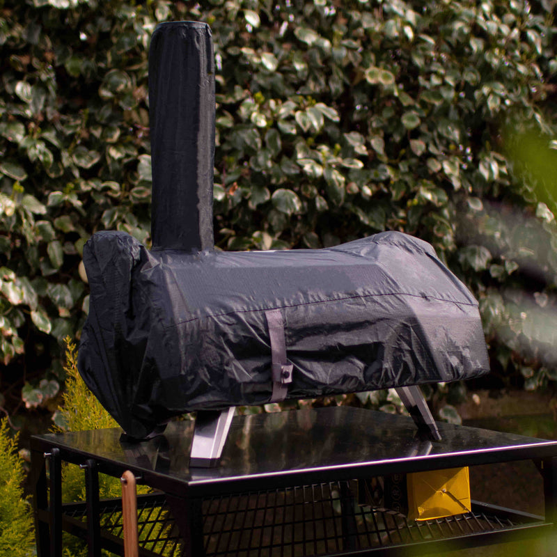 Protective cover hugging legs with secure fit for outdoor Ooni Karu ovens
