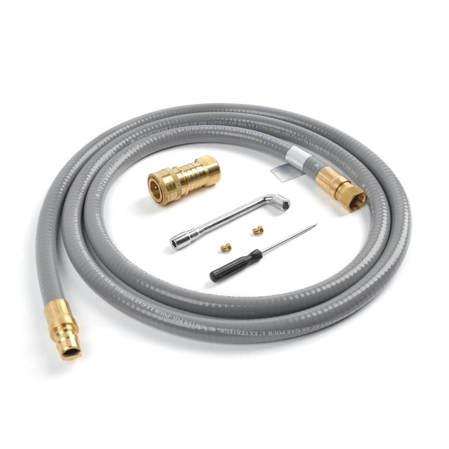 Gray pressure washer hose with brass connectors and tools on a white background