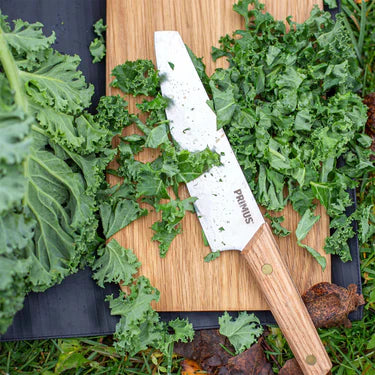 Knife and cutting board roll up neatly in PU-coated G-1000 wrap for compact transport