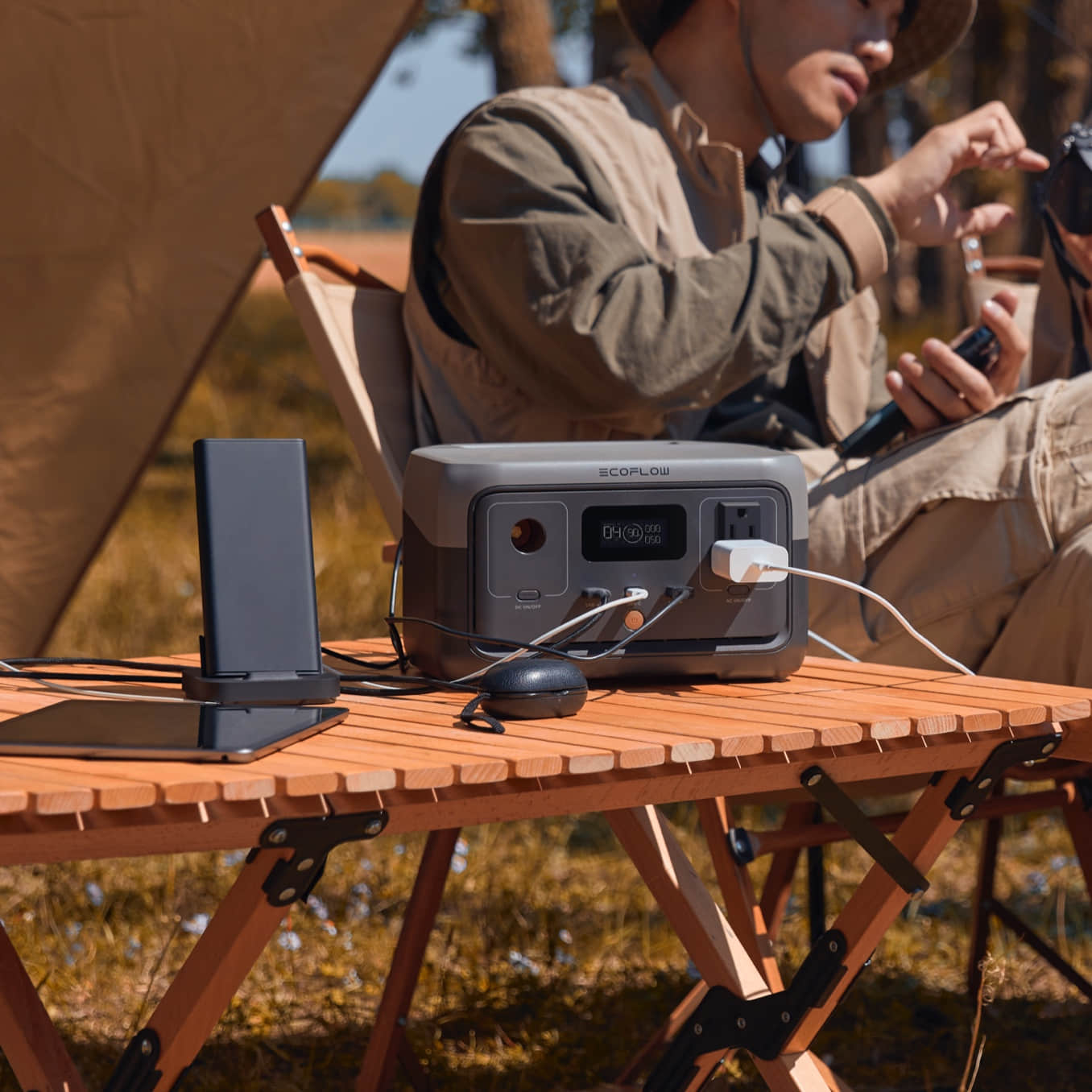 Portable solar generator connected to solar panels for renewable energy charging