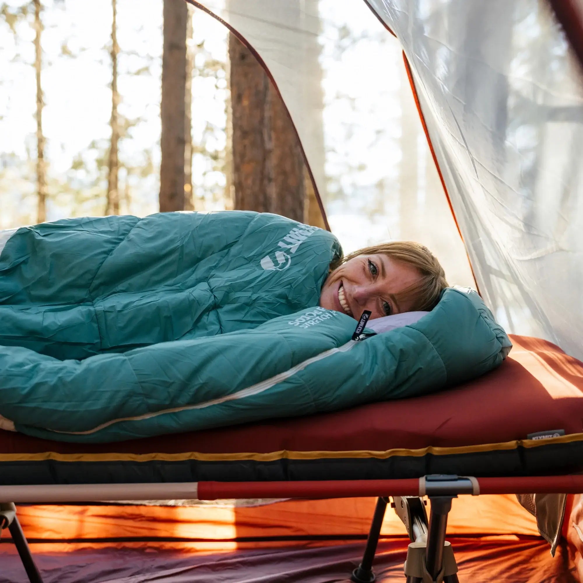 Water droplets beading on the Sojourn Stretch 20’s durable 20D nylon shell, showcasing its water-resistant properties for protection against moisture.