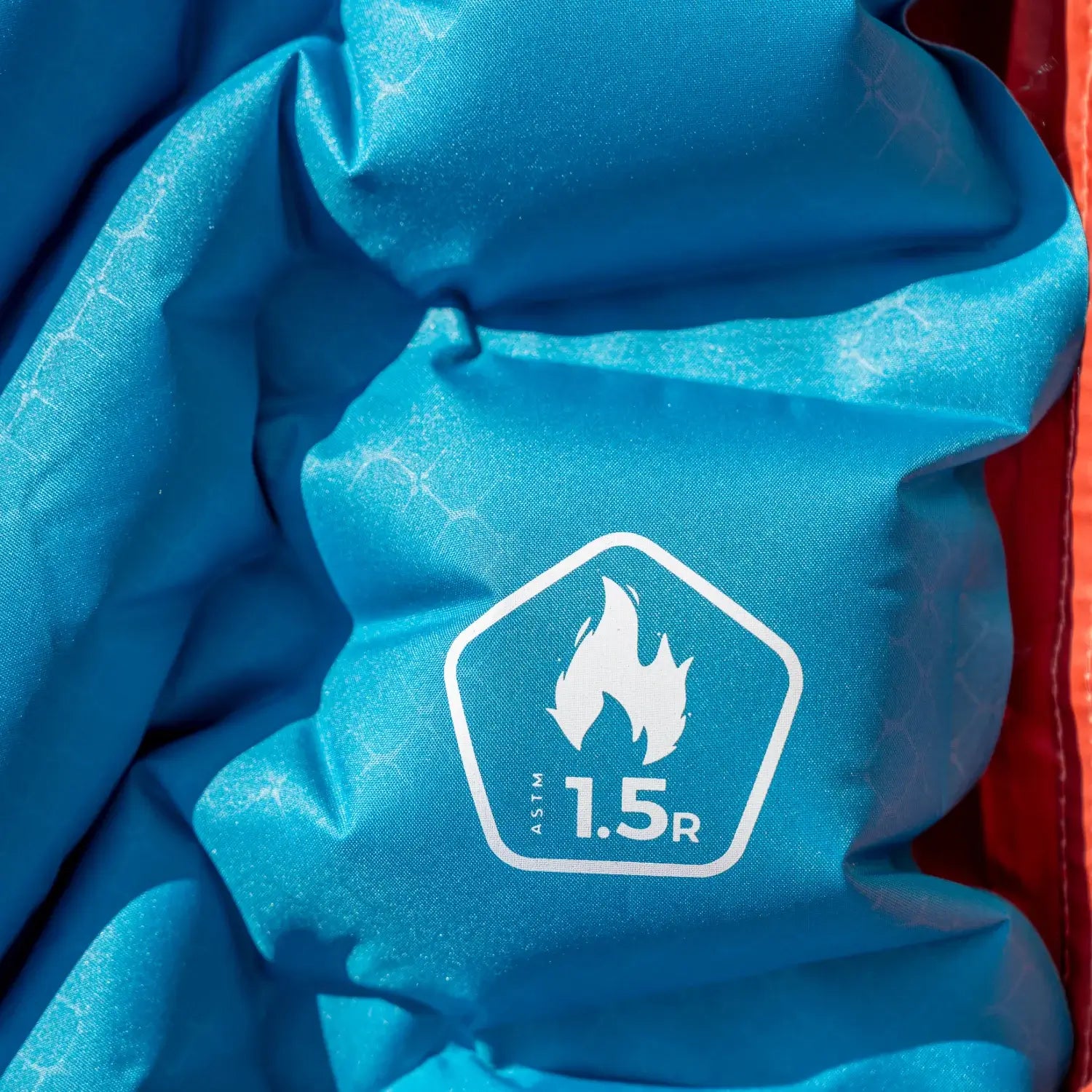 Sleeping pad with deep weld zones to improve sleeping bag loft