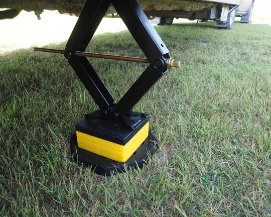 The Base by SnapPad increases footprint and durability of plastic RV leveling blocks, protects against cracks and crush damage