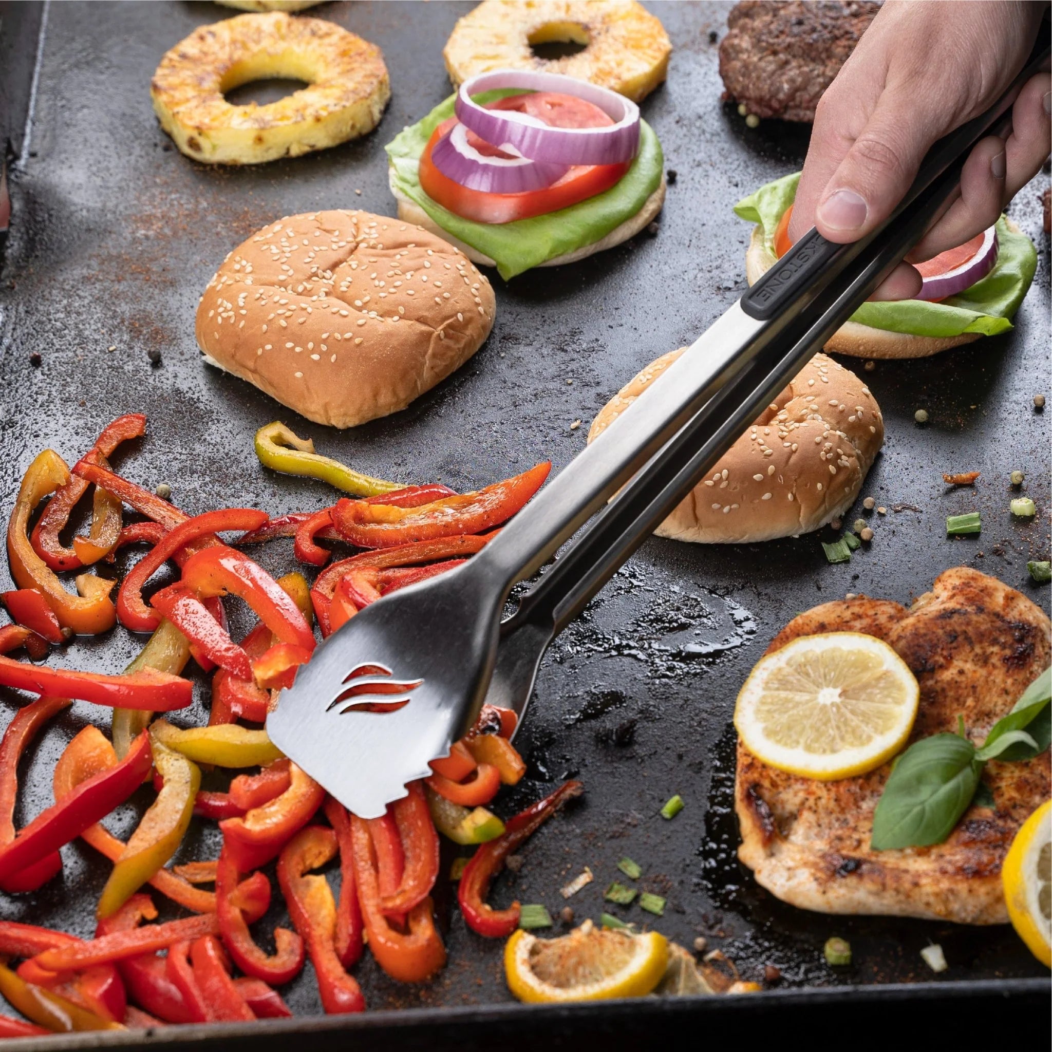 Blackstone deluxe griddle utensils with hanging loops for side shelf hooks