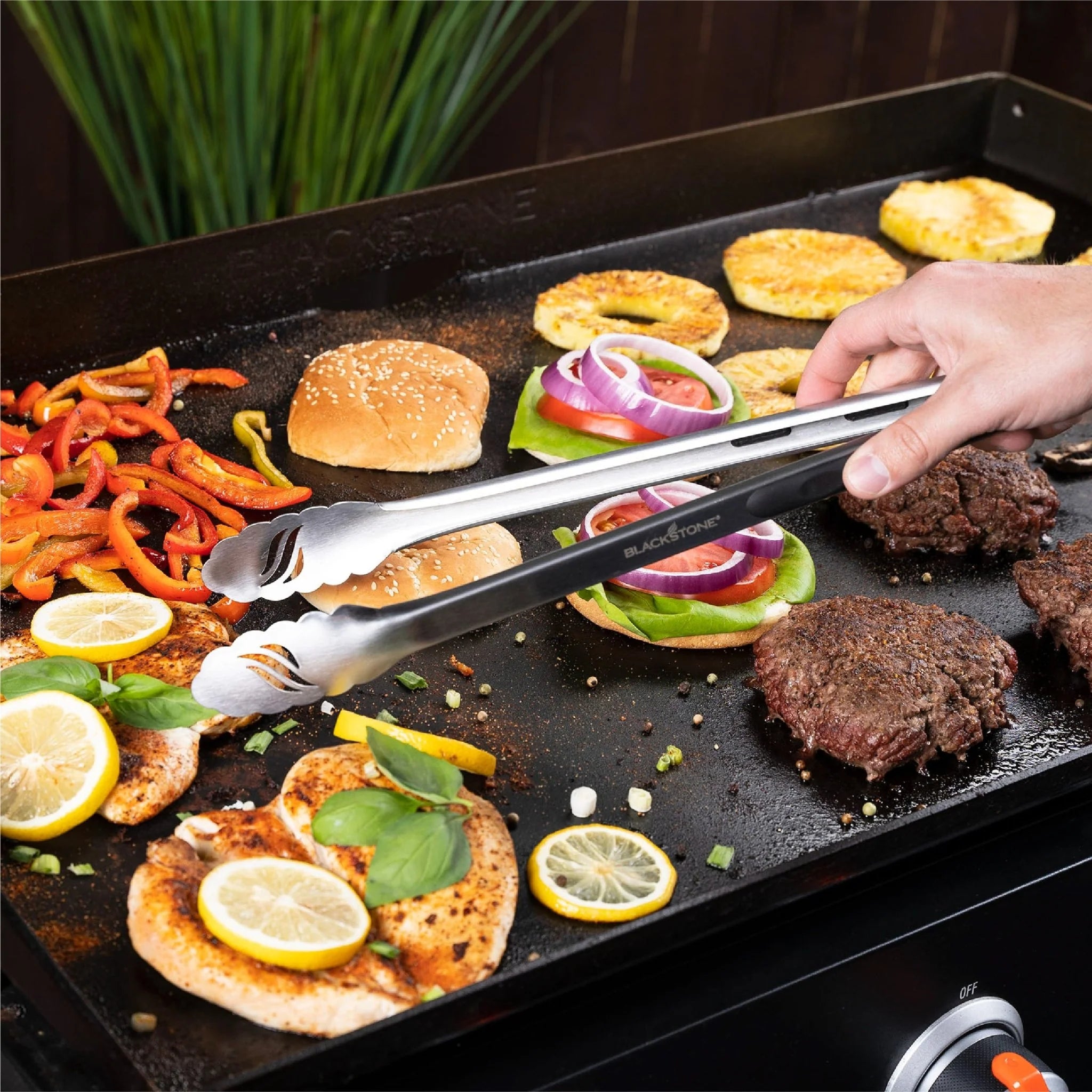 Blackstone BBQ griddle tool set with two spatulas scraper and cooking tongs
