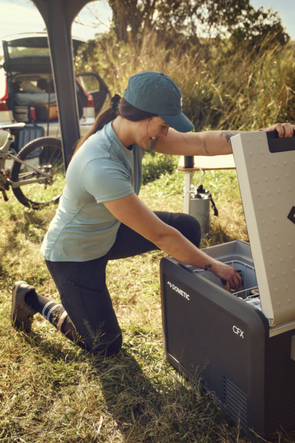 CFX3 app interface showing temperature control, performance history, and notifications for the Dometic CFX3 electric cooler.