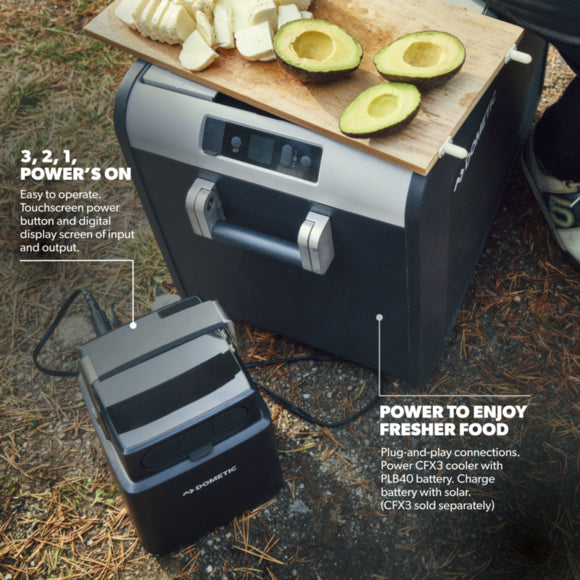 Close-up view of the integrated LCD screen on the Dometic PLB40 displaying battery capacity, charging status, and output information.