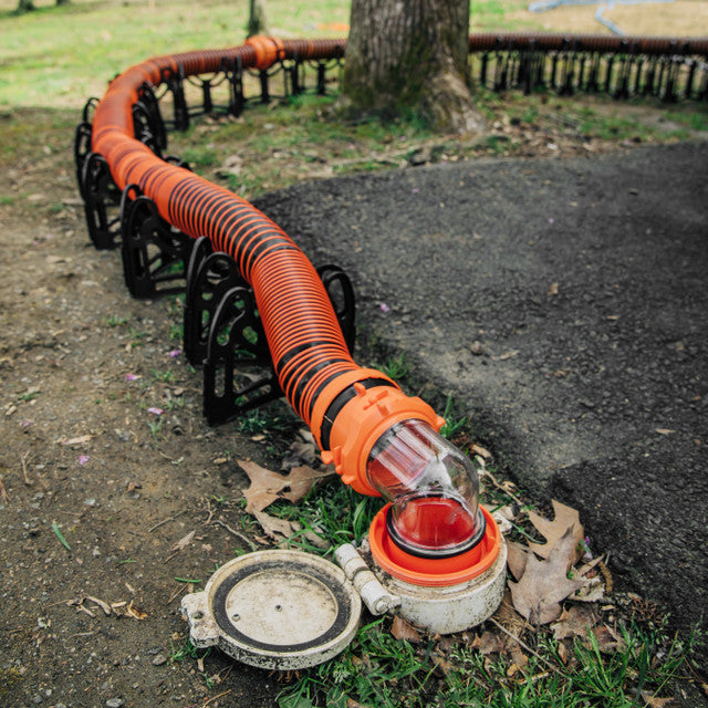 10-foot RhinoEXTREME RV sewer hose extension connected to RV sewer system