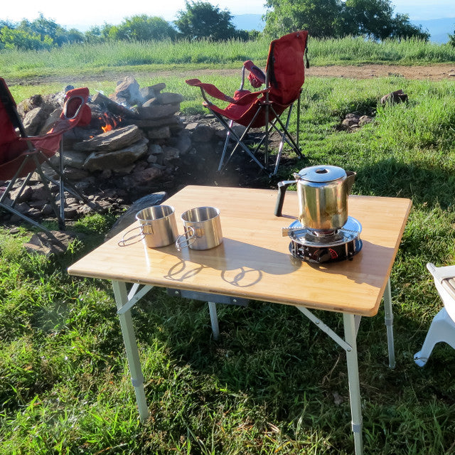 Portable bamboo camping table with foldable design and adjustable height
