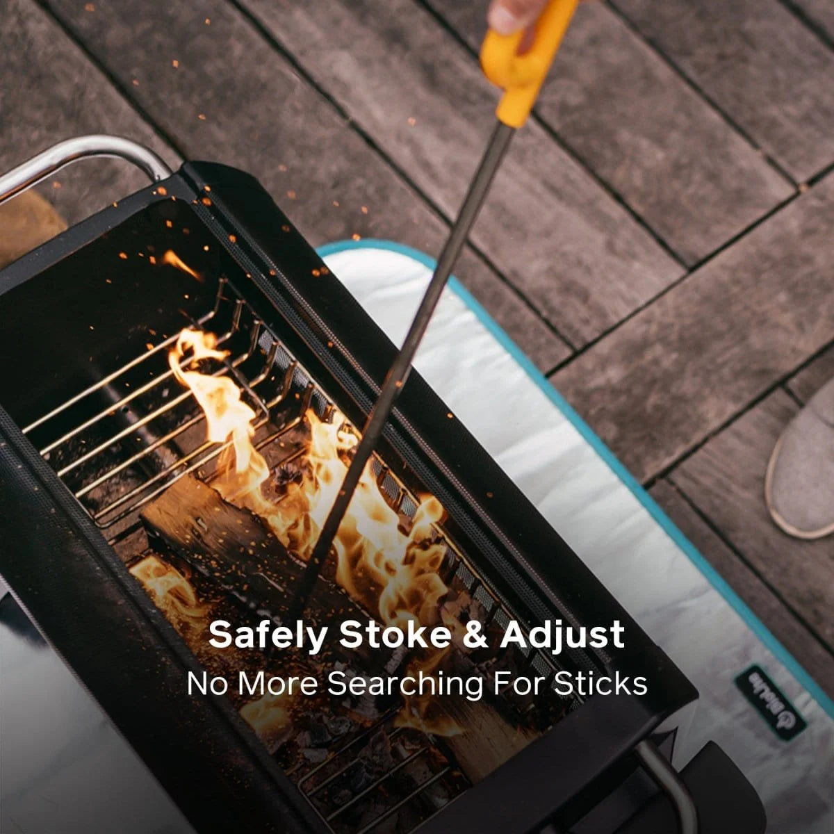 Biolite firepoker to safely stroke and adjust fire