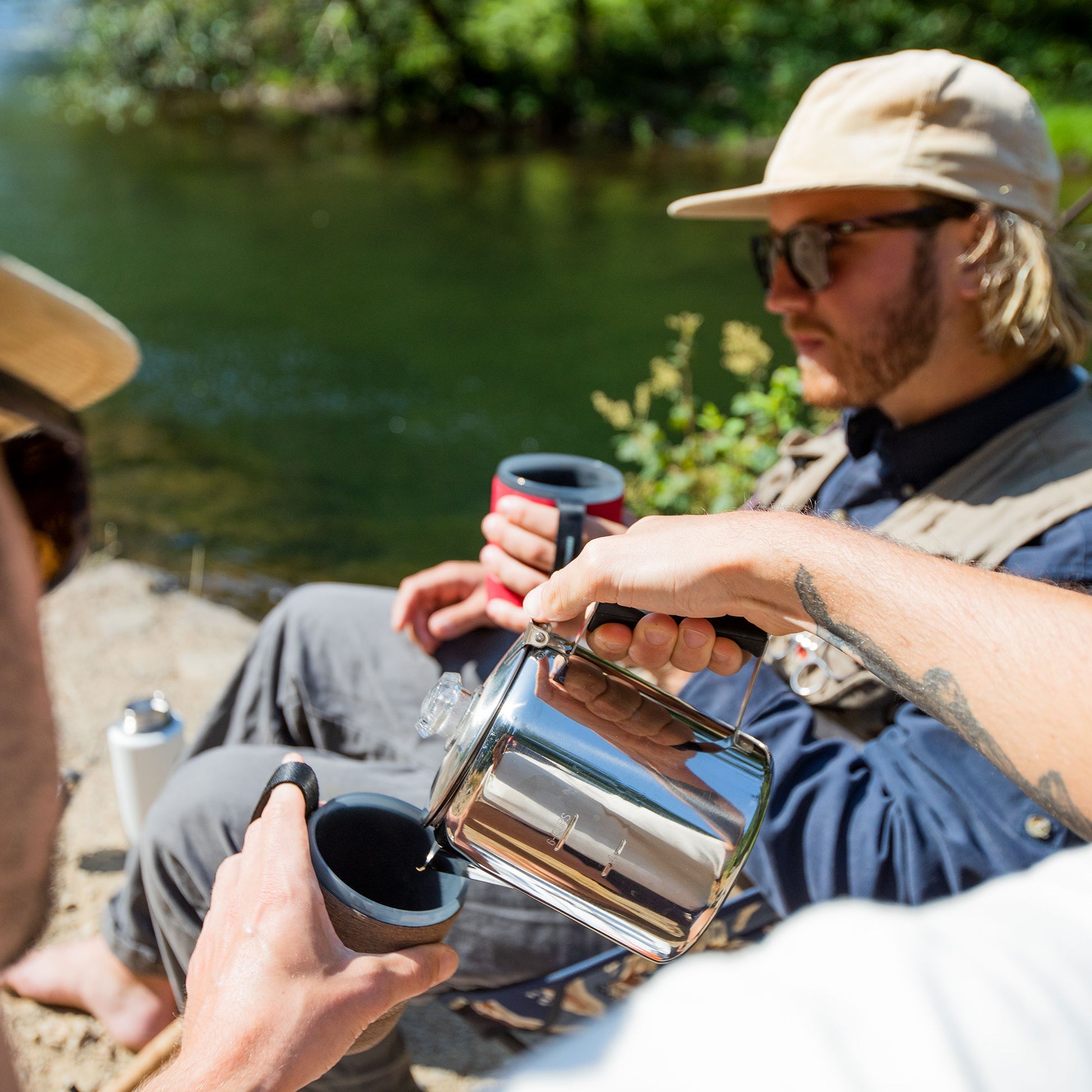GSI Outdoors Glacier Stainless 9-cup coffee percolator for camping and outdoor cooking.