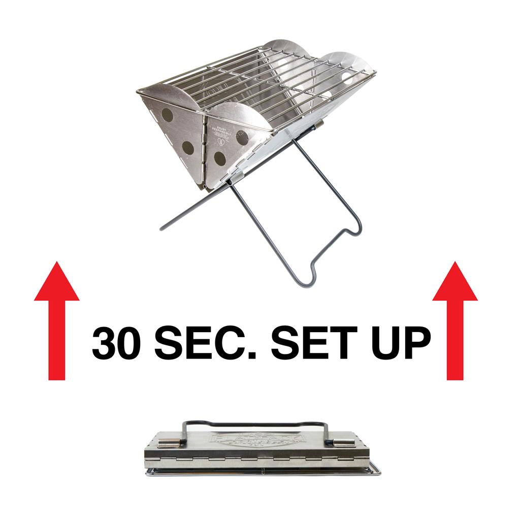 Mini Flatpack portable grill fully set up with grates on top, ready for grilling with a stable base.