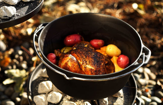 GSI GUIDECAST Dutch oven in campfire cooking setup