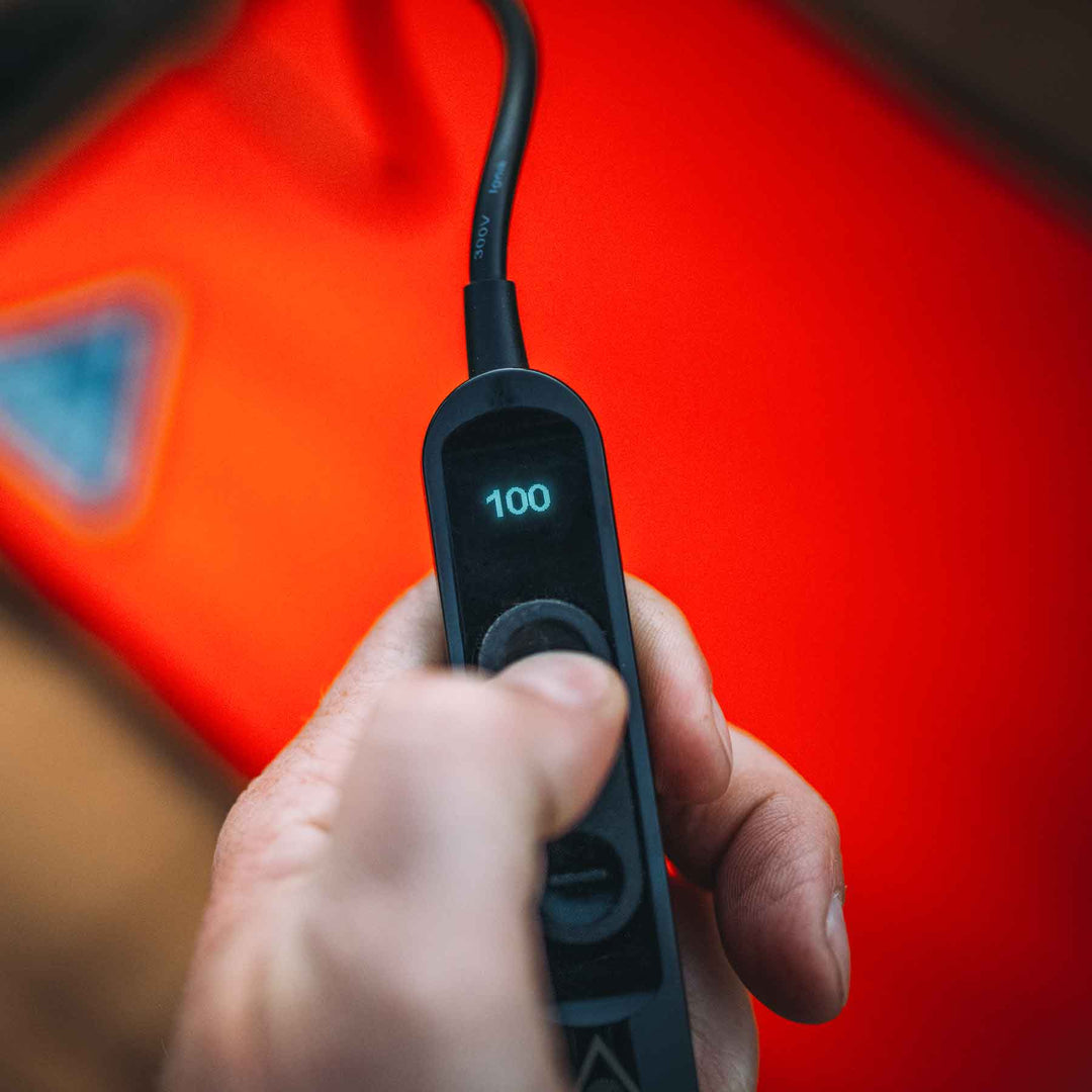 Ignik Backside Heated Pad XL showing handheld control for heat settings