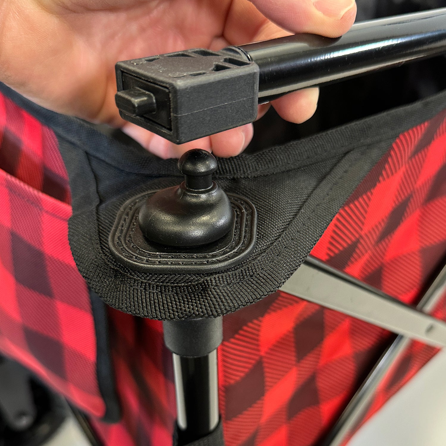Removable and folding steel hanging rack attached to the Kodiak Utility Cart, adding extra functionality for carrying additional gear
