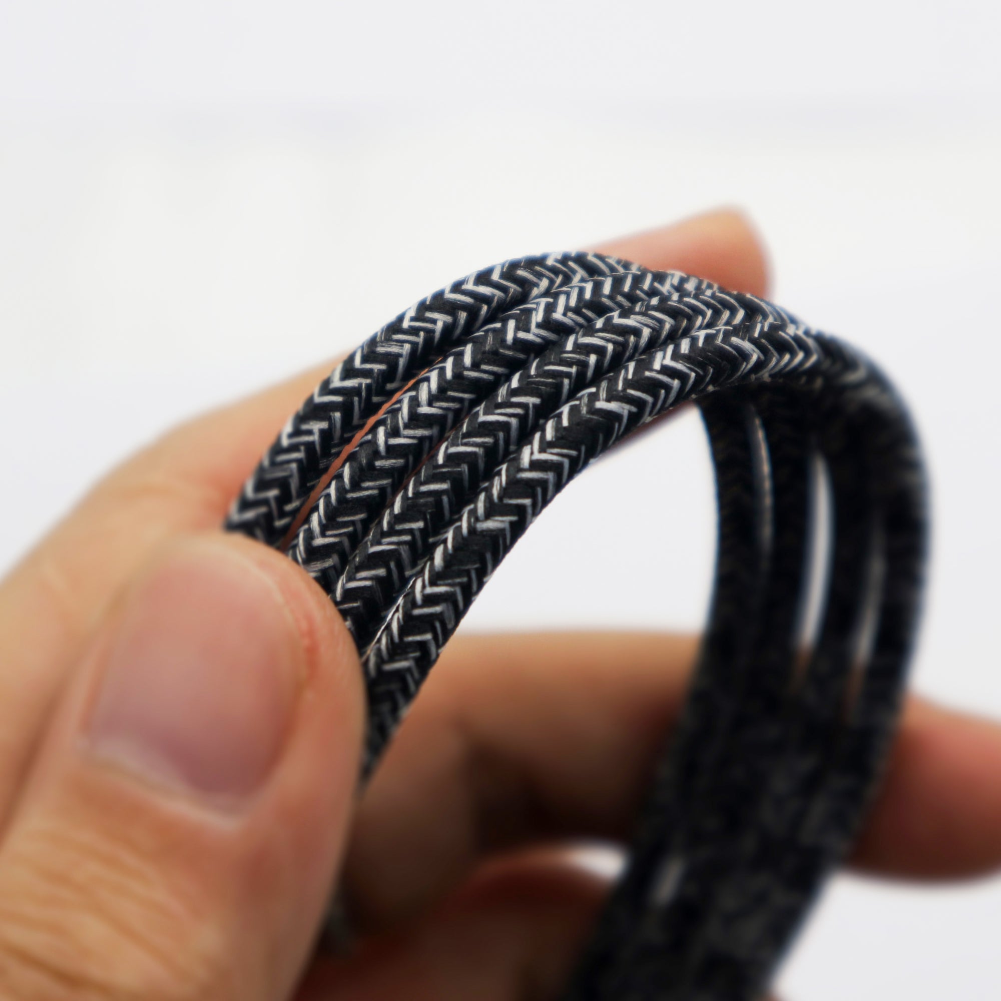 Durable braided cable with silicone tie strap