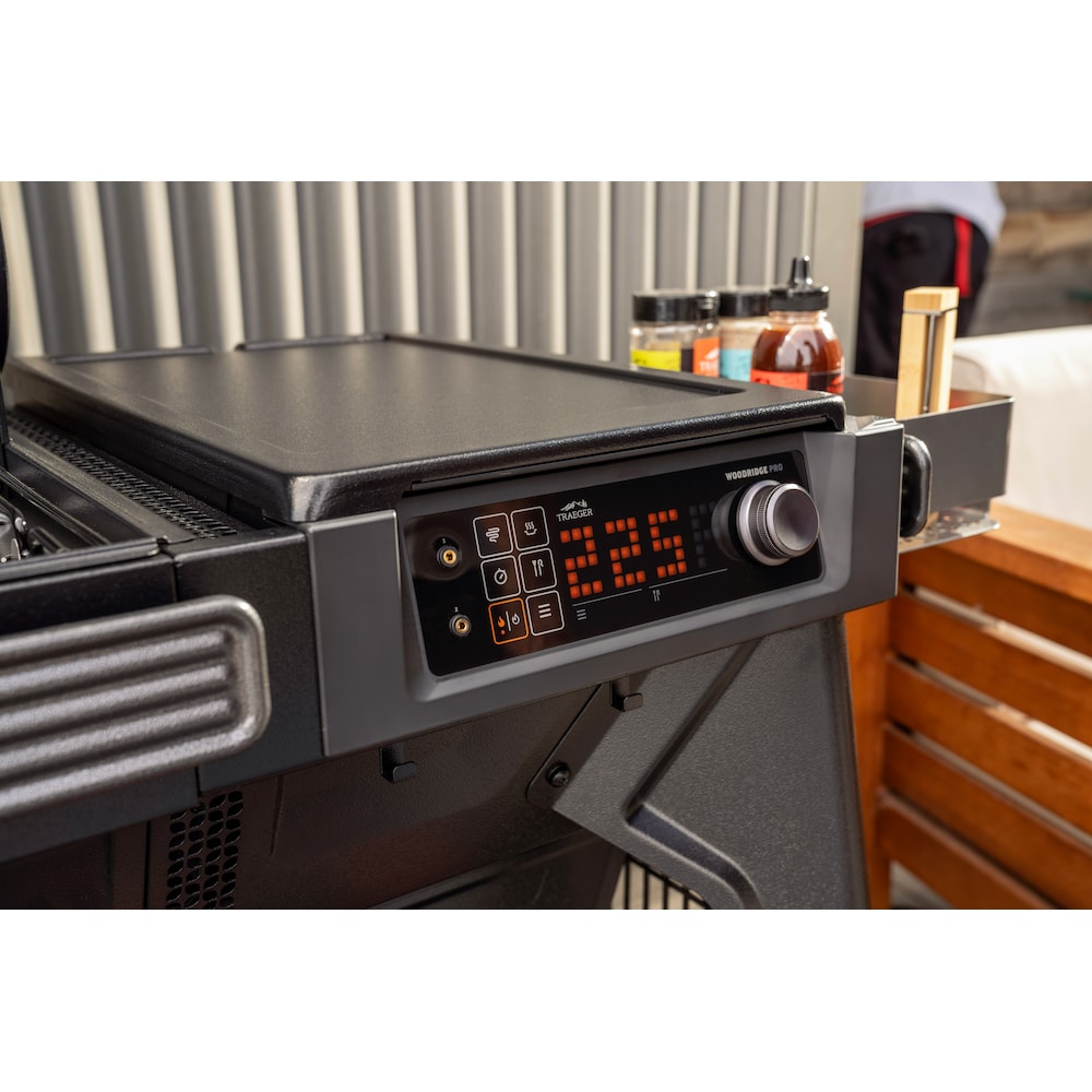Traeger Woodridge Pro outdoor pellet grill featuring precision temperature control