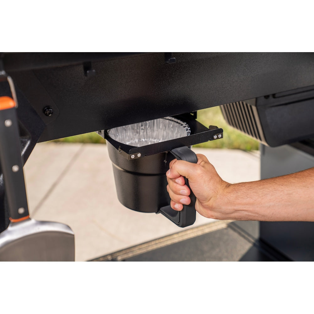 Traeger Woodridge Pro BBQ pellet grill with storage cabinet and side shelf