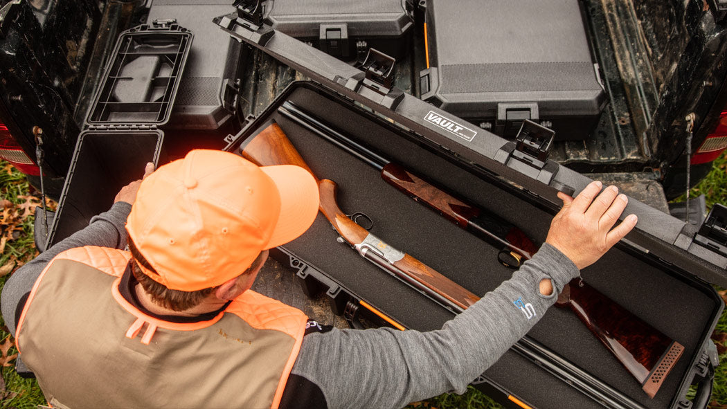 Close-up of the Vault series gun case's six push-button latches, ensuring secure closure with easy-open access for convenience and enhanced firearm protection