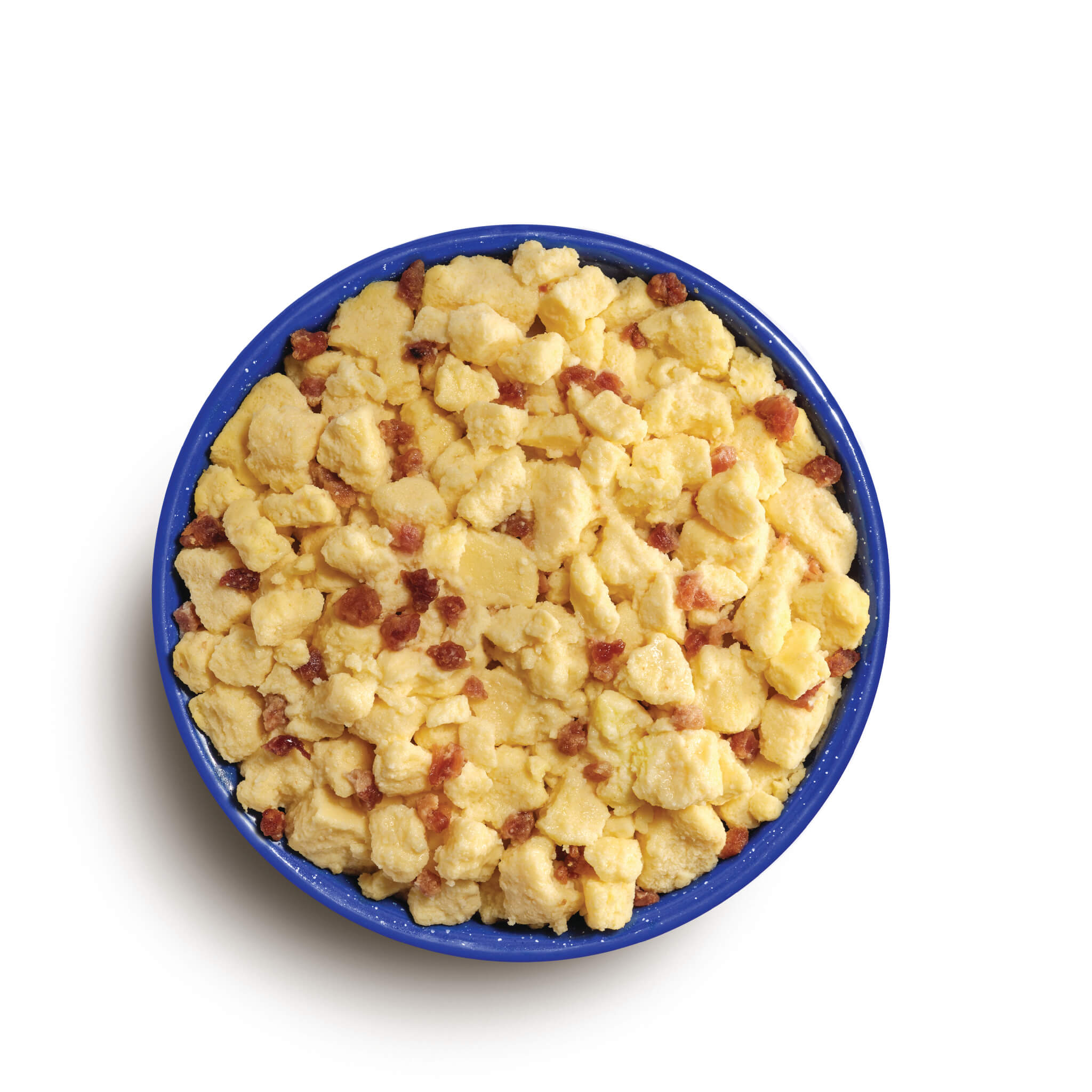 Blue bowl filled with scrambled eggs and bacon on a white background