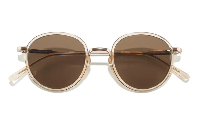 Baia round sunglasses with metal frames, inspired by John Lennon’s classic style, featuring a retro look with premium CR-39 polarized lenses for clear vision and 100% UVA/UVB protection.