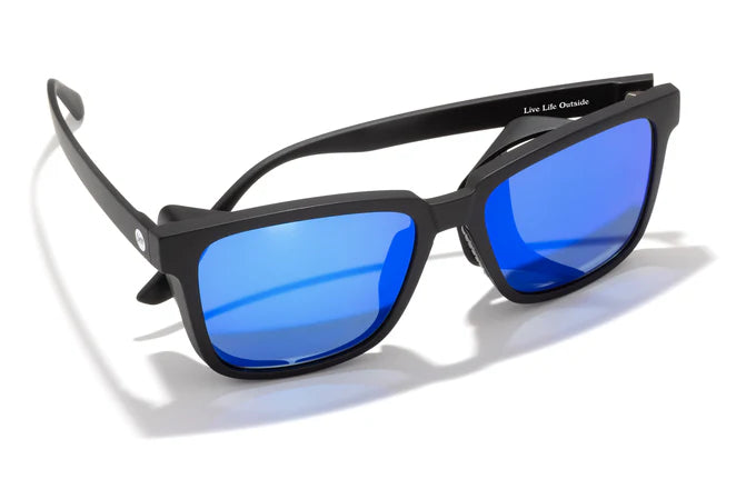 Available lens options for the Couloir sunglasses include Forest (green tint, 11% VLT), Amber (amber tint, 12% VLT), Blue (slate tint, 15% VLT), and Silver CAT 4 (grey tint, 6.26% VLT).