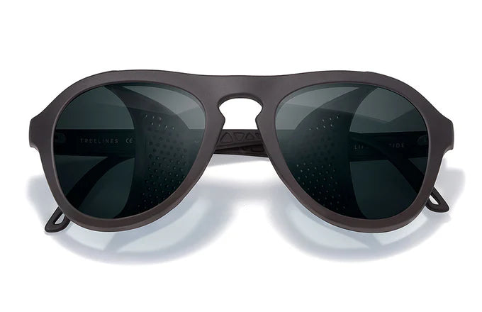 Mountaineering sunglasses with an aviator shape and glacier goggle-inspired design. Features removable magnetic side sun shields, perforated to prevent fogging and enhance peripheral vision