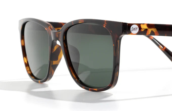 Person wearing Ventana sunglasses in a casual outdoor setting, highlighting versatility