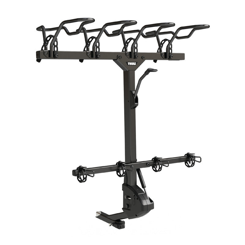 Thule ReVert with bikes loaded – A fully loaded bike rack carrying multiple mountain bikes with secure wheel baskets and generous spacing.