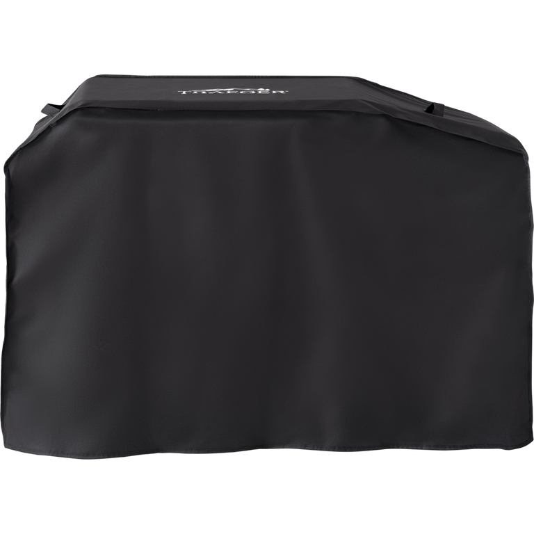 Irontop 4-Burner Full-Length Grill Cover protecting an outdoor griddle from weather and debris.