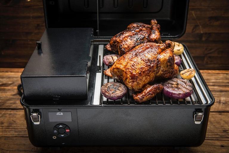 Outdoor cooking with Traeger Ranger pellet grill camping setup