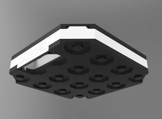 Stacked StakPad™ RV jack pads forming a column and pyramid, each pad adding 1.5 inches of height, ideal for leveling RVs