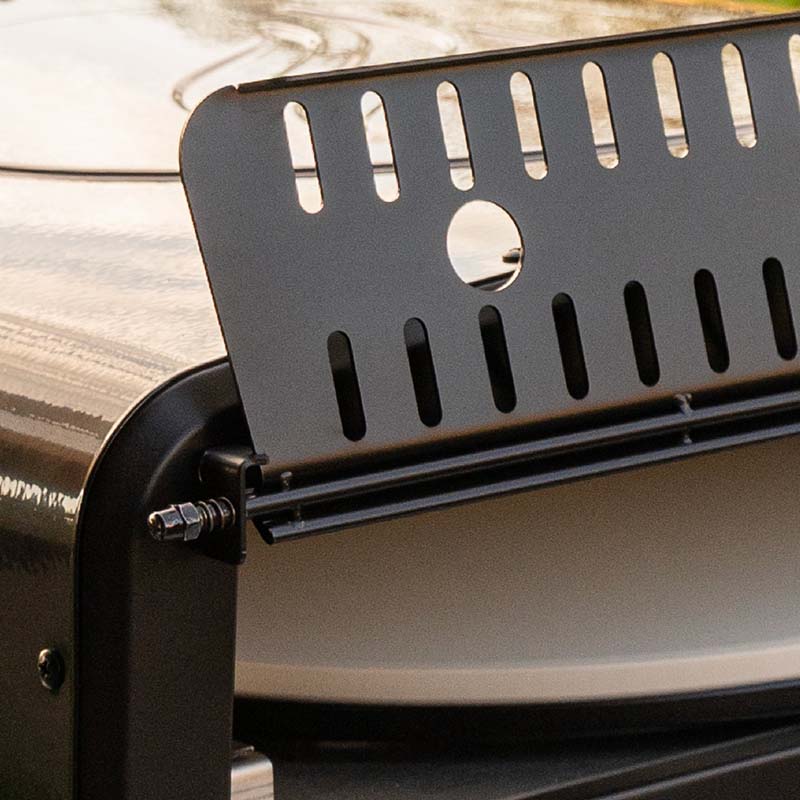 Outdoor setup featuring Blackstone Leggero Pizza Oven in use for gourmet pizza cooking