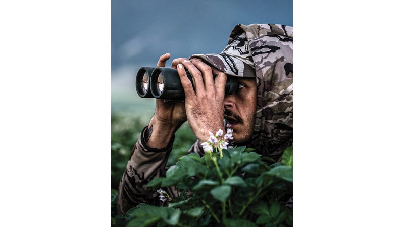 Vortex Diamondback HD 10x50 binoculars shown with the included GlassPak binocular harness and accessories.