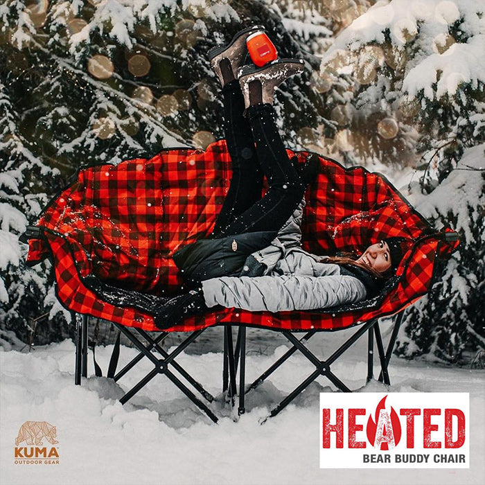 a person showing the size of heated chair