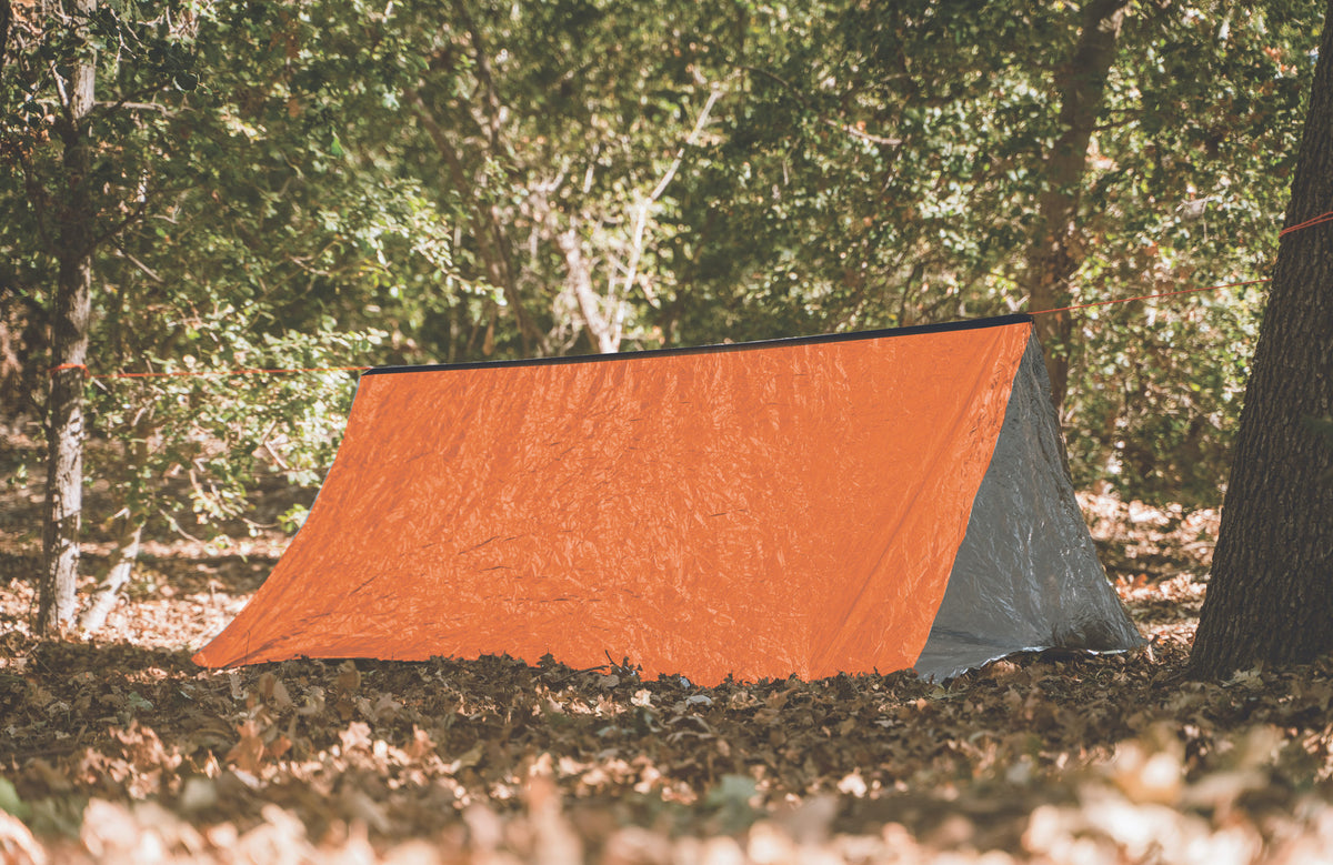 Two-person survival tent with metalized polyethylene material

