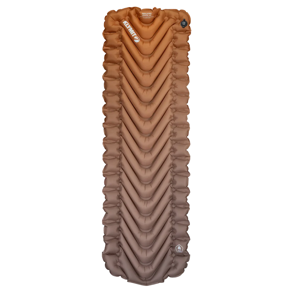 Compact and lightweight packed Insulated Static V2 sleeping pad, measuring 4.75 x 7.5 inches for easy transport