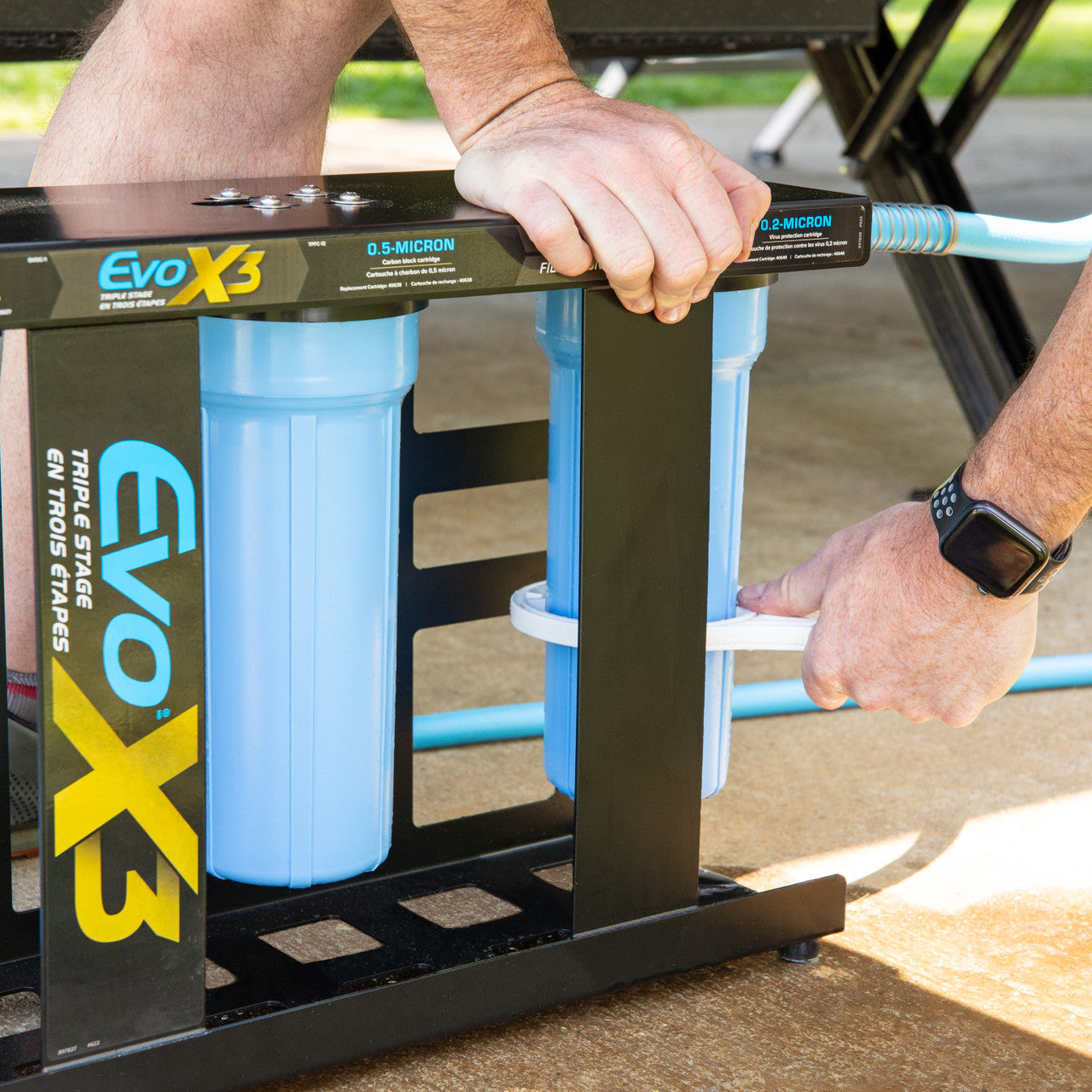 High-flow water filter system for RV, demonstrating strong, continuous water flow through the Camco Evo X3 filter system, ideal for showers and faucets.