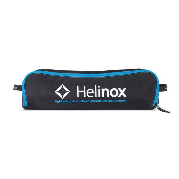 Helinox Sunset Chair highlighting side pockets for storage, shock-corded poles for easy setup, and a robust frame capable of supporting up to 320 lbs.