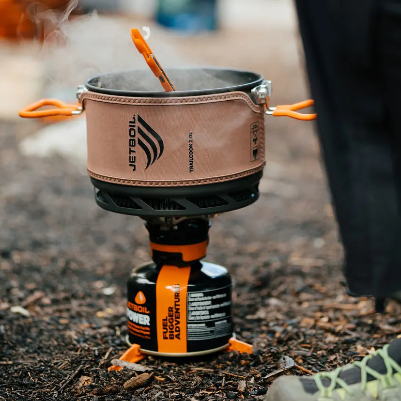 TrailCook 2.0L backpacking stove system with folding silicone grip handles