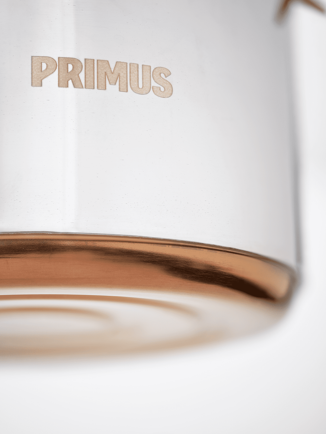 Stainless steel camping kettle with folding handle, perfect for coffee, tea, or hot chocolate outdoors

