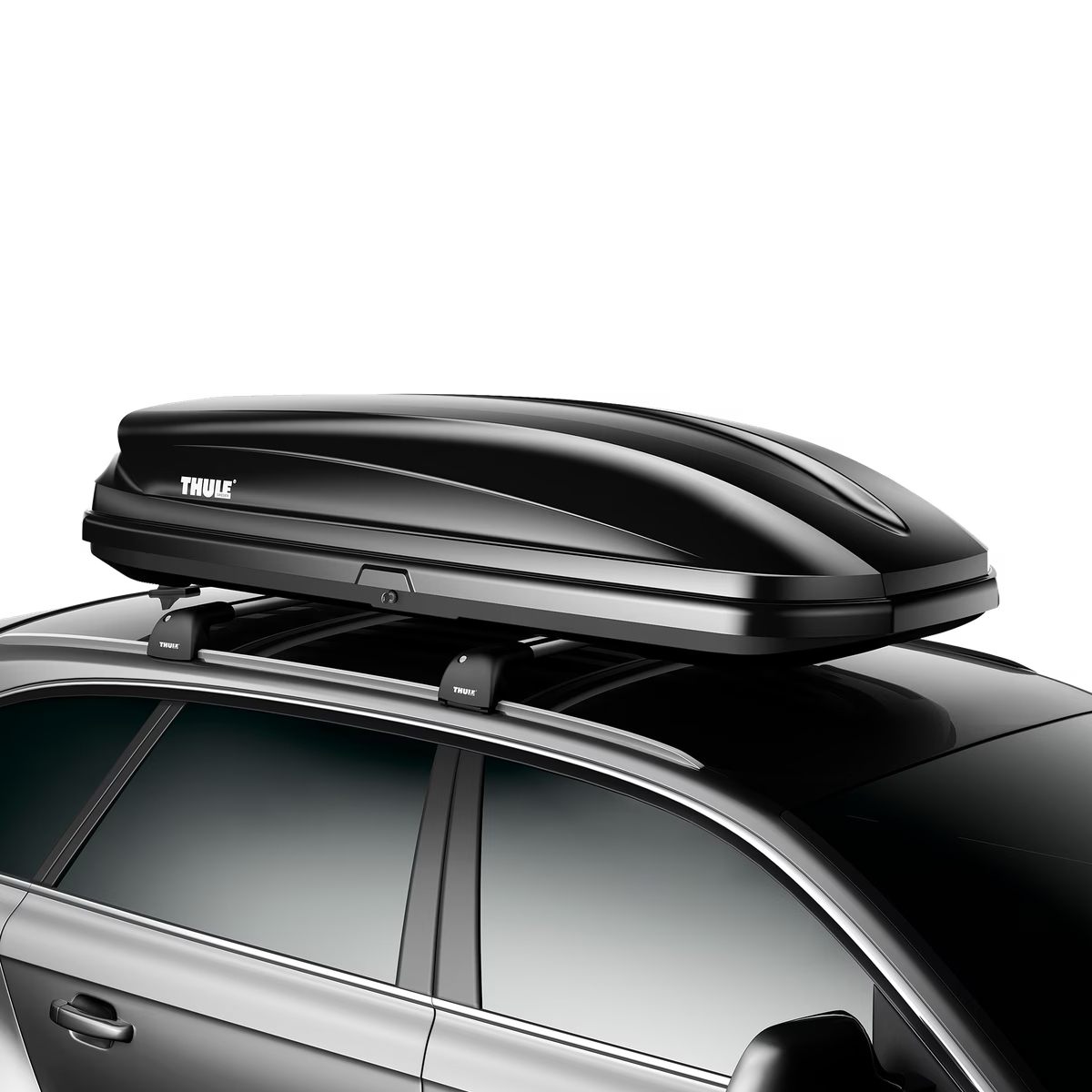 Car with a Thule roof box on a white background