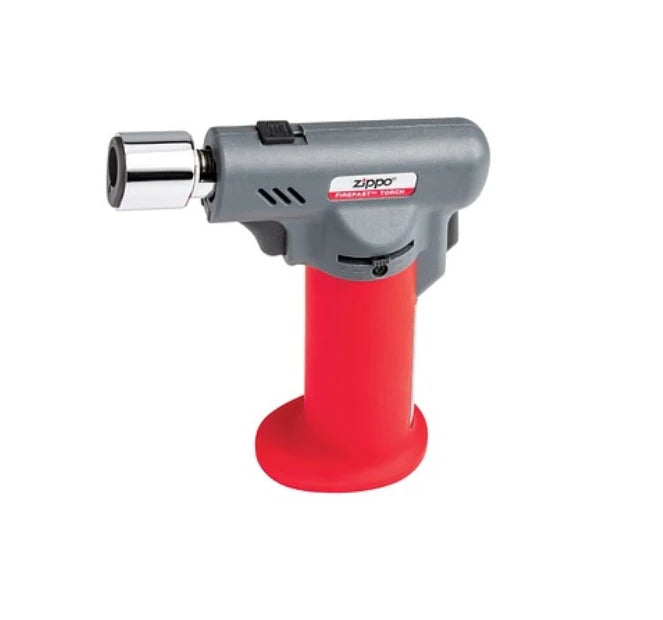 Zippo butane torch with red nozzle on a white background