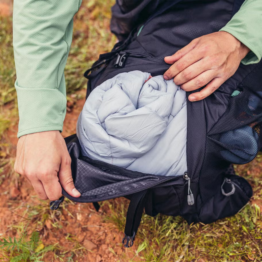 Men's outdoor backpack with hydration compatibility and multiple trail-access storage pockets