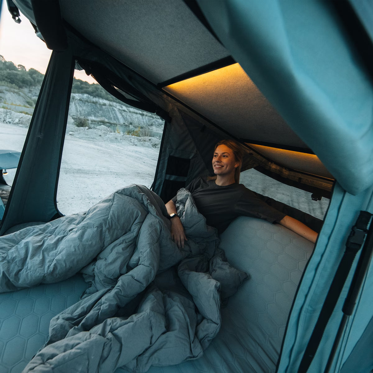 Thule Widesky rooftop tent interior storage mesh pockets and felt ceiling